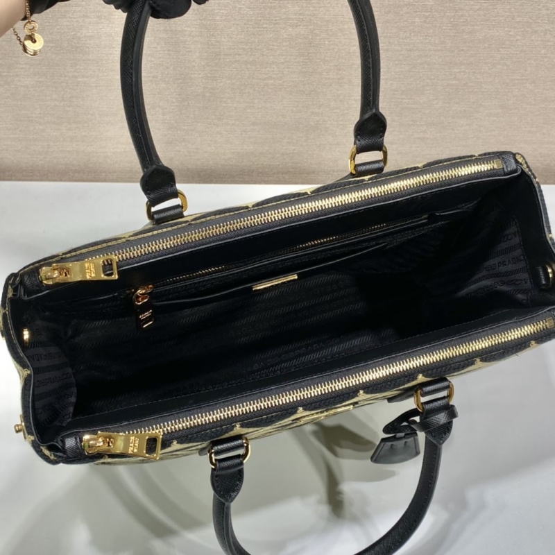 Pra*a top handle bags